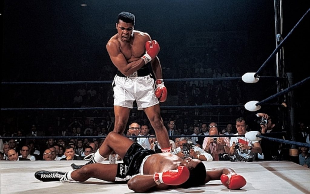 Mohammad Ali winning a bozxing match